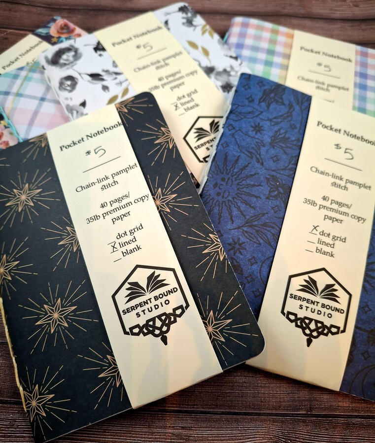 "Pocket Notebooks" - 4"x5.25" notebooks made with a variety of cardstock covers and handbound using a loop pamphlet stitch